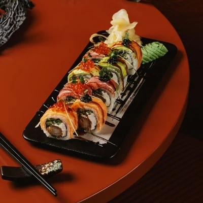 A set of rolls on a black tray